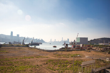 Kowloon, Hong Kong - 10.12.2020 : view of port near Kwun Tong Tsai Wan, Victoria Harbour seen from Yau Tong