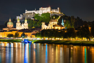 Salzburg at night. City skyline with Festung Hohensalzburg castle, Austria