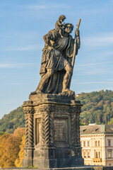 Statue of Child Christus on the shoulder of saint Christopher located at Charles Bridge in Prague. Czech Republic