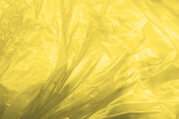 Illuminating yellow and gray plastic texture background