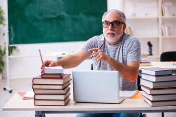 Old male student in tele-education concept