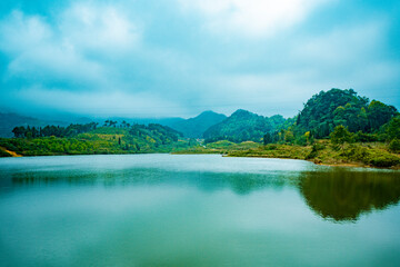  road in the mountains with blue sky on the background at Ha Giang province, Viet Nam