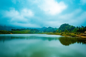  road in the mountains with blue sky on the background at Ha Giang province, Viet Nam