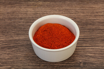 Dry paprika powder in the bowl