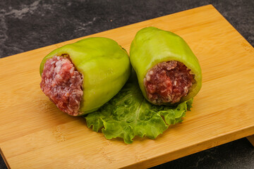 Raw stuffed bell pepper with meat