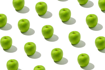 Trendy sunlight summer pattern of the green apple. Minimal summer concept on white background.