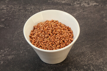 Raw buсkwheat cereal in the bowl