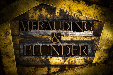 Merauding & Plunder text on vintage textured bronze grunge copper and gold background