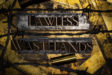 Lawless Wastelands text on vintage textured bronze grunge copper and gold background