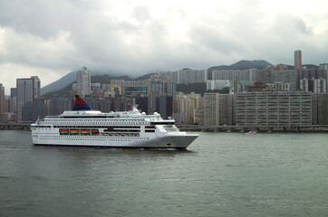 Classic cruiseship cruise ship liner Pisces arrival into Victoria Harbor in Hong Kong Honkong,...