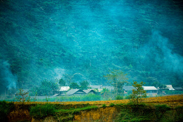 road in the mountains with blue sky on the background at Ha Giang province, Viet Nam