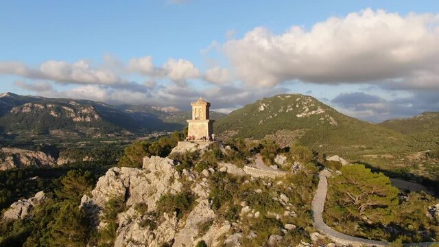 beautiful sunset in the mountains of mallorca with an amazing view of the mediterranean sea, the mountains, the forrest and the sunset. Concept of travel and holidays.