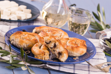 Pastry swirls with cheese and olive filling.
