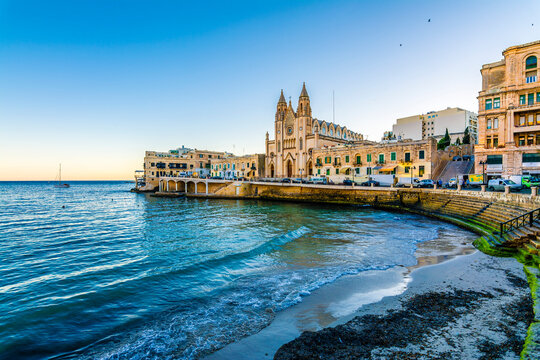 Our Lady of Mount Carmel Church on Balluta Bay in St. Julian's, Malta. St Julians is populer tourist destination in Malta.