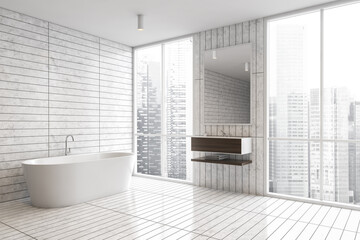 White tile bathroom corner with tub and sink