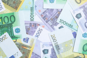 Banknotes of 100 euros, 200 euros and 500 euros. Euro banknotes. Finance, currency exchange.