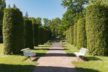 Late barocco styled Sagadi Manor, built in 18th century, Estonia. Sunny summer day. Terrace with a pond
