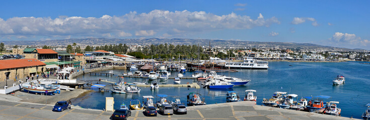 Fototapeta na wymiar PAPHOS, SOUTHERN CYPRUS, JULY the harbor on a busy summer day
