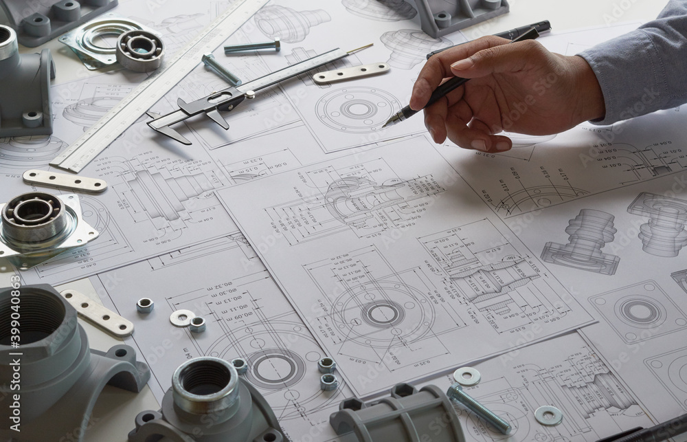 Aufkleber Engineer technician designing drawings mechanical parts engineering Engine.manufacturing factory Industry Industrial work project blueprints measuring bearings caliper tools
