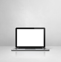 Laptop computer on white concrete office scene background