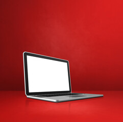 Laptop computer on red office scene background