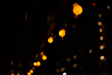 Fairy lights for christimas as illuminated decoration for christmas tree or as festive lights on the table create a romantic and festive atmosphere on christmas eve and during the happy new years eve