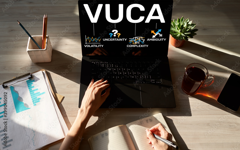 Poster vuca world concept on screen. volatility, uncertainty, complexity, ambiguity.