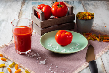 Tomatoes on a table in a basket