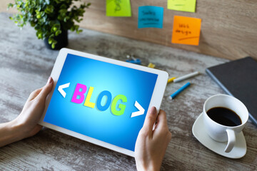 Tablet with BLOG text the on screen. Social network, Communication and internet marketing concept.