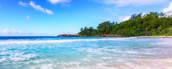 panorama of beautiful lonely tropical beach, police bay, seychelles