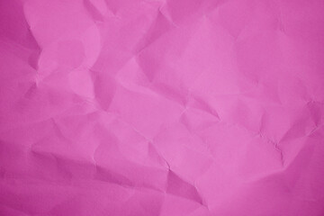Fototapeta premium Magenta Sheet crumpled paper color background Close up Copy space