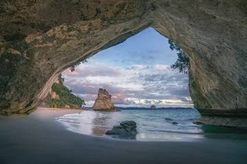 Foto auf Acrylglas view from the cave at cathedral cove beach at sunrise,coromandel,new zealand © Christian B.