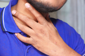 unrecognized man suffering throat pain close up 