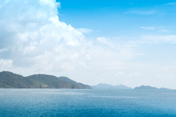 Views of the nature of the vast sea with islands. With clear sky and white clouds. At Koh Chang island of Tart Thailand.