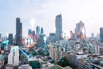 Social media icons hologram over panorama city view of Bangkok, Asia. The concept of people...