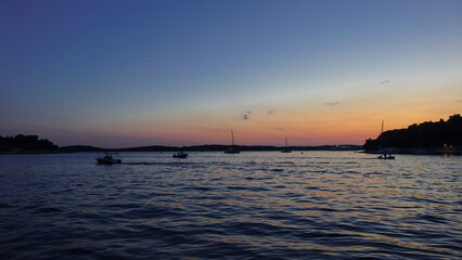 Sunset on Hvar Island Croatia with boats