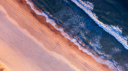 Aerial top down view over Gold Coast ocean and beach © Bostock