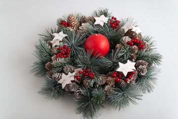 Christmas wreath close up on white background. New Year's decorations. Winter Holiday pattern