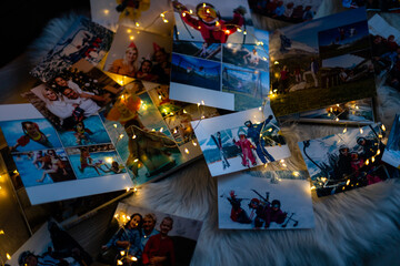 photo books lie near the fireplace at christmas