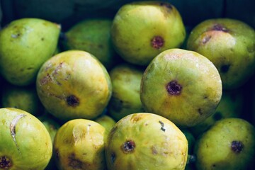Fresh delicious figs in a box in a street food market in summer, ready to sell
