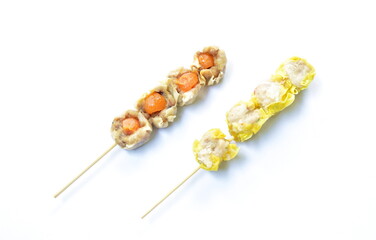 Chinese dumpling stuffed mashed pork with salty egg and crab stabbing wooden stick on white background