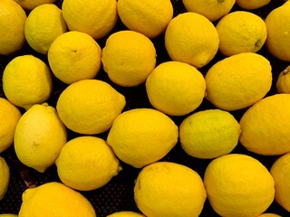 Yellow lemon fruit close up, as a background