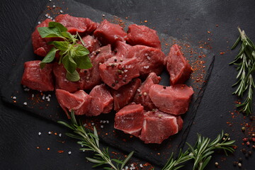 Diced raw beef with ingredients, herbs and spices