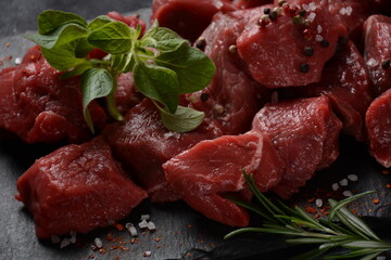 Diced raw beef with ingredients, herbs and spices