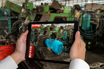 Engineer use augmented reality software in smart factory production line with automated application...