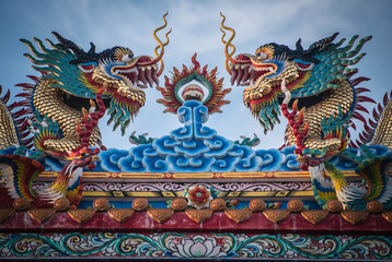 Ambush at a Chinese shrine gate, a pair of dragons, Naklua, Pattaya, Thailand