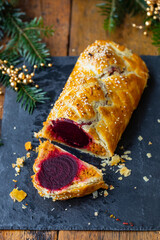 Vegetarian beetroot and butternut squash pie in rough puff pastry