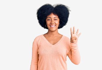 Young african american girl wearing casual clothes showing and pointing up with fingers number four while smiling confident and happy.