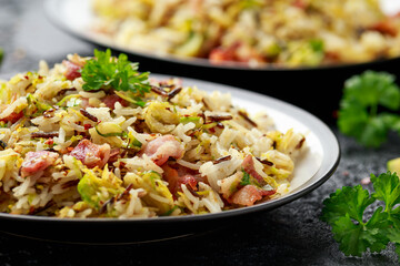 Fried Brussels sprouts with rice and crispy bacon