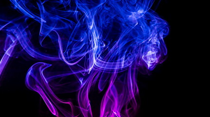 Colored smoke on black background